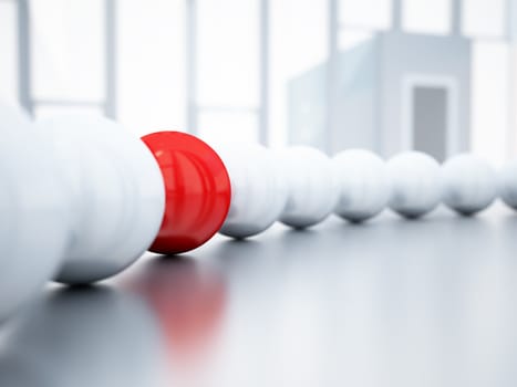blurred white balls and red ball is in focus on blurred light background