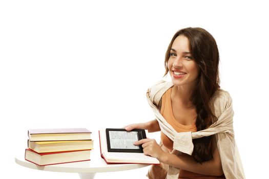 happy young woman with books and ebook on white background