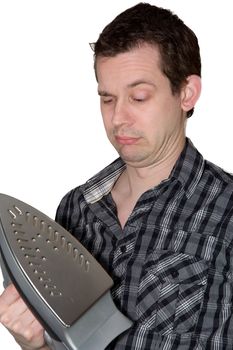 Picture of a man confused by a iron, not sure what to do