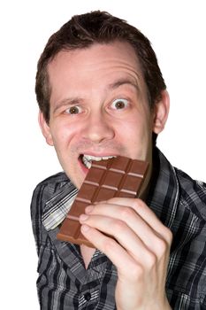 Picture of a man crushing his teeths on a mighty hard chocolate