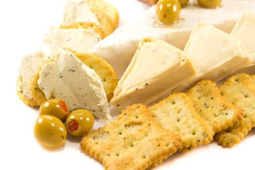 Picture of cheese and olives with crackers on the side