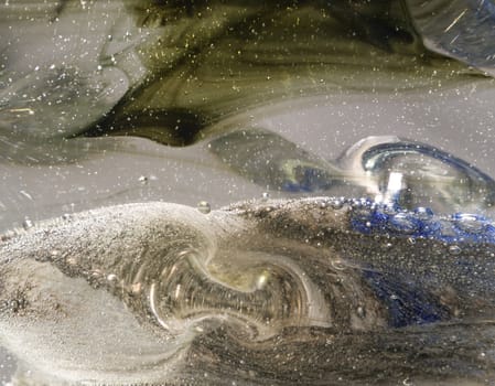 abstract detail of a glass sculpture looking like a surreal landscape