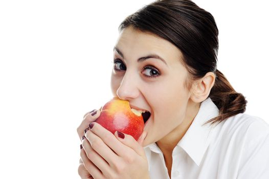 Portrait of a beautiful young woman, holding an apple.