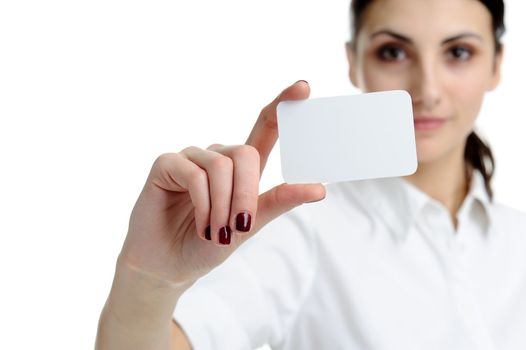 Woman holding businesscard in hand. Focus on card.