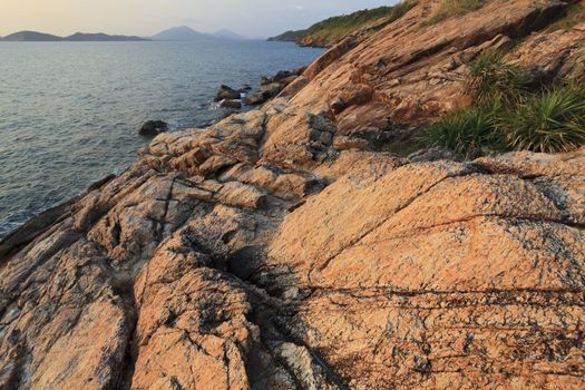 Before beatiful sunrise on the rocks, Rayong, Thailand.