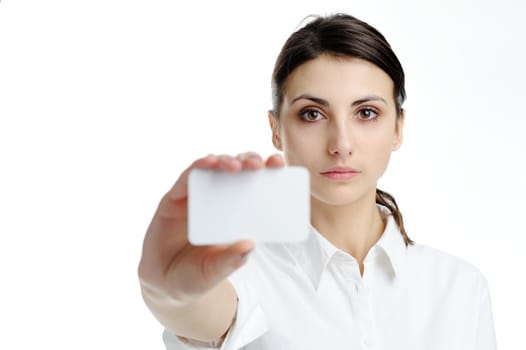 An image of young woman holding blank businesscard in hand