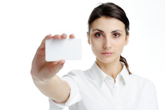 An image of young woman holding blank businesscard in hand