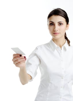 An image of young woman holding blank businesscard in hand