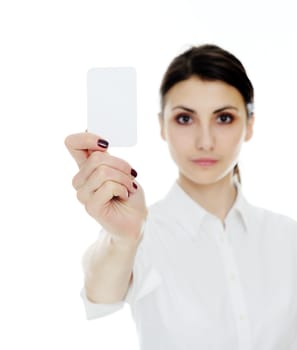 An image of young woman holding blank businesscard in hand. Focus on card 