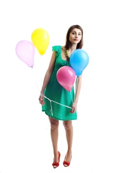 A young beautiful woman with bright balloons