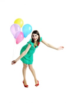 A young beautiful woman with bright balloons