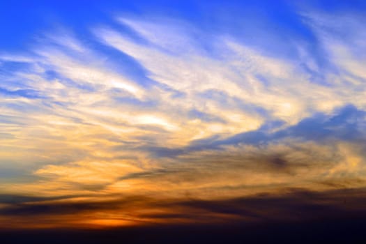 Red clouds in a blue sky