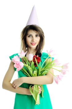 A young beautiful woman with pink tulips 