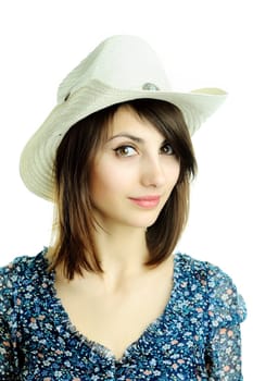 An image of a young beautiful woman in a hat 