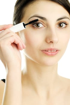 An image of a young woman with mascara