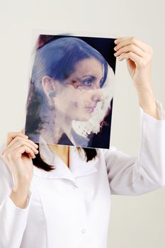 An image of female doctor with x-ray