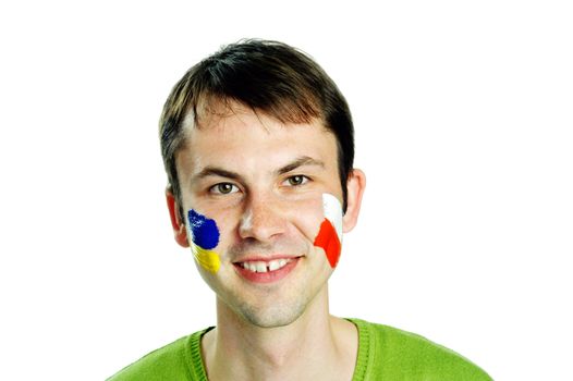 An image of football fan with flags on face