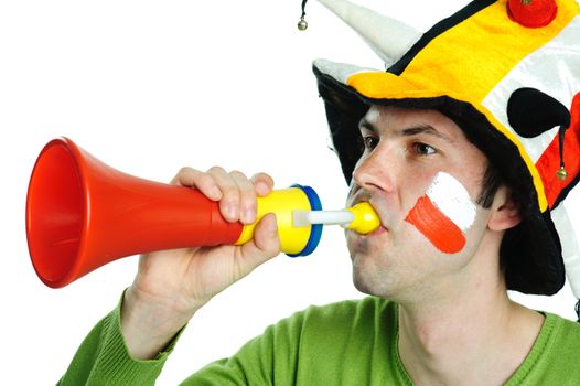 An image of soccer fanwith plastic trumpet