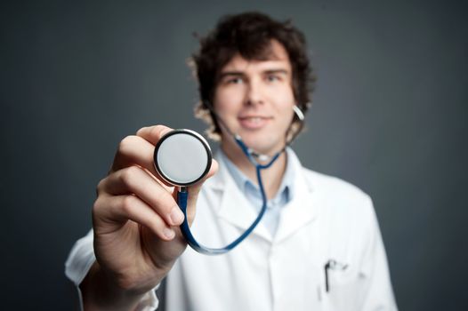 An image of a young physician with a stethoscope