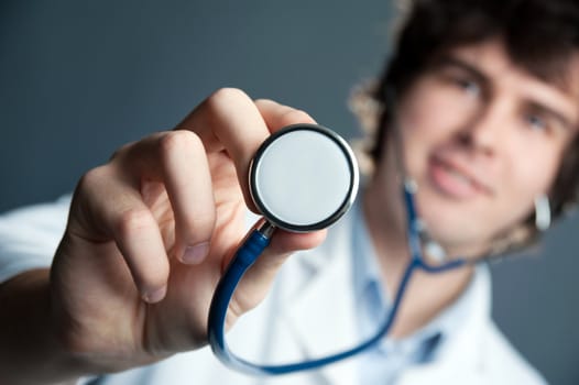 An image of a young doctor with a stethoscope