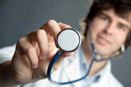 An image of a young doctor with a stethoscope