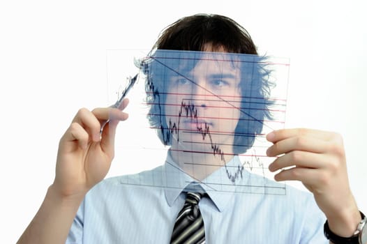 The businessman looks at the chart printed on a transparent material