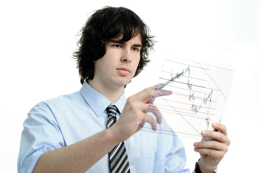 The businessman looks at the chart printed on a transparent material