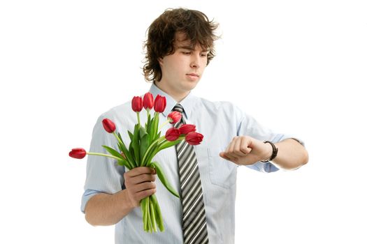 A portrait of a young man with red tulips