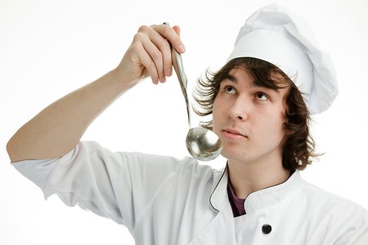 An image of a cheerful young chef with a ladle