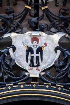 Munich coat of arms, also called Munich Kindl at plate of the Munich town hall, Bavaria, Germany.