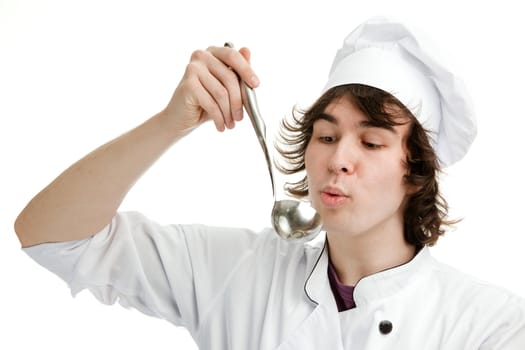 An image of a cheerful young chef with a ladle