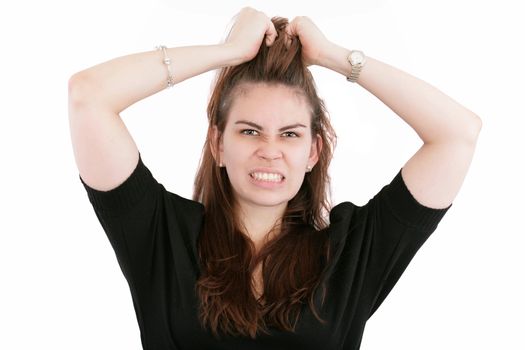 Stress. Business woman frustrated and stressed pulling her hair.
