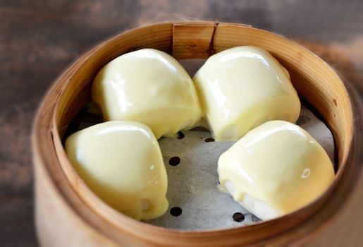 Chinese steamed cheese on mini buns , dim sum   