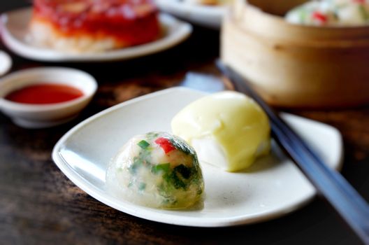 crystal chives dumpling and  mini buns  on dish