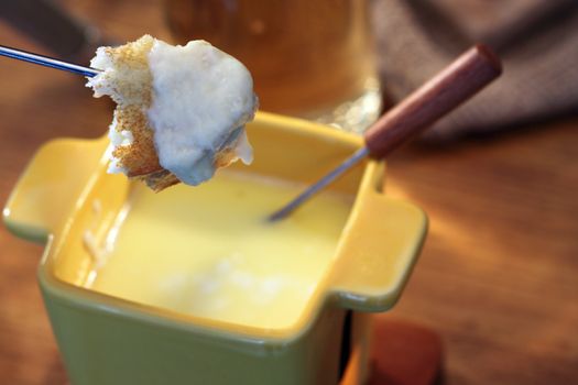 Cheese fondue in a small bowl  close up