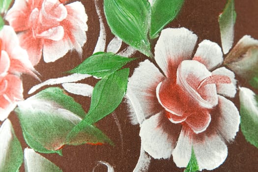 flower and green leaf print on brown fabric