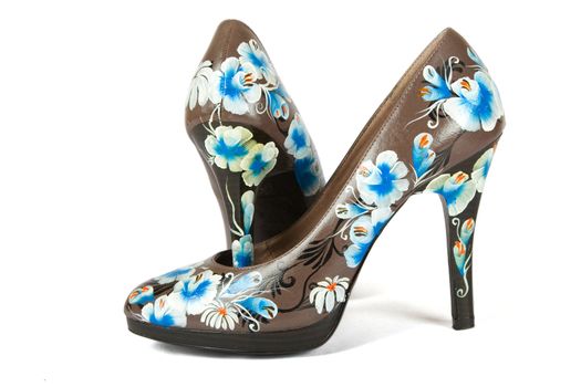 brown women high heels shoes with printed flower on white background