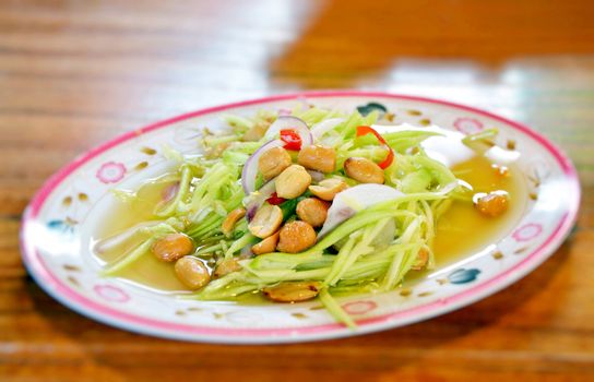 spicy mango salad , thai style food