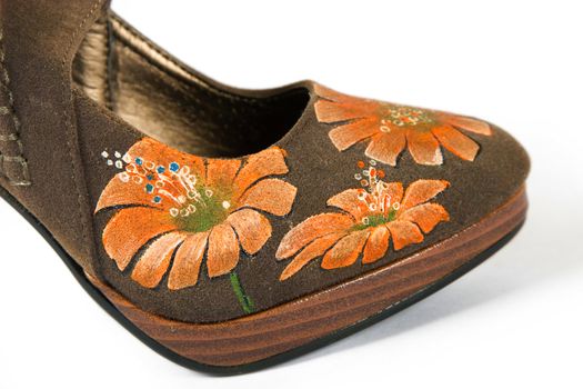 brown women high heels shoes with printed flower on white background