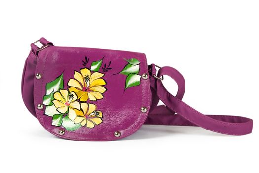 A floral pattern womens hand bag, isolated on a white background