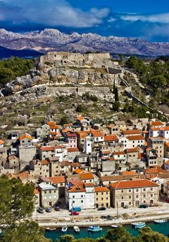 Novigrad dalmatinski with fortress, and Velebit mountain in back