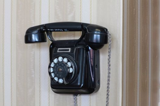 the old wall mounted phone