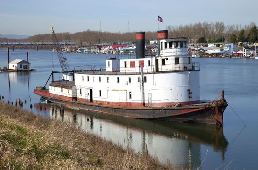 Old utility ship on a river Portland OR.