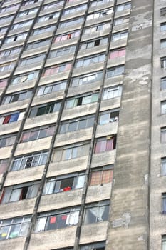 Facade of a rundown building in a poor neighborhood in the center of Sao Paulo, Brazil.