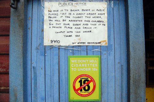 Public notice at the door in store, village in Papua New Guinea