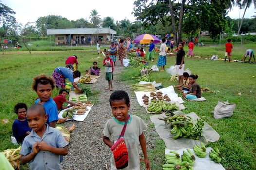 People on market at the village in Papua New Guinea