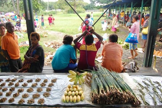 People on market at the village in Papua New Guinea