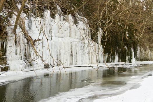 frozen river with ice. rural scene in south germany