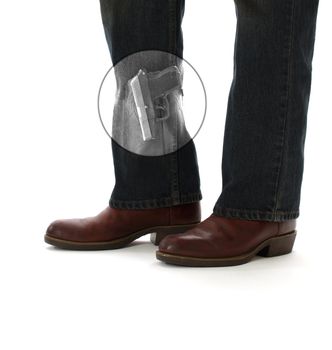 A man conceals a pistol in his boot to offer himself protection against the danger caused by the criminals of modern society