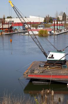 Small crane on a stern of a barge, Portland OR.